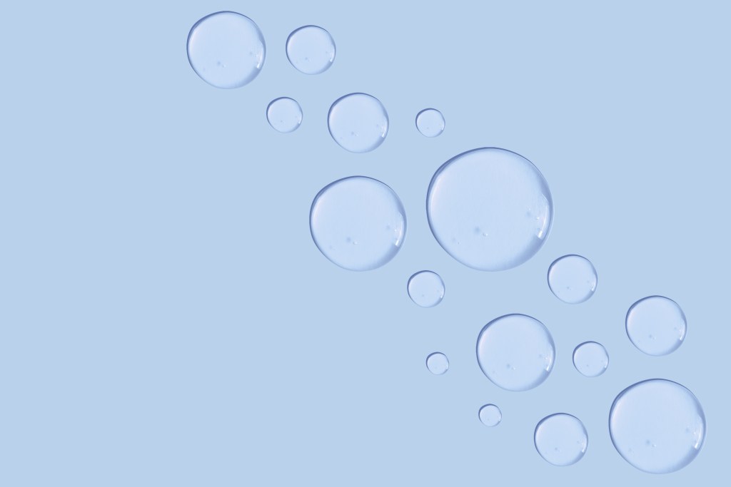 set of drops of gel texture on a blue background